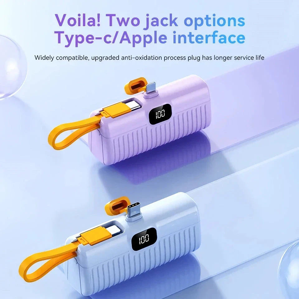 A compact, dual-port 30,000mAh power bank with built-in charging cables and fast charging capabilities.