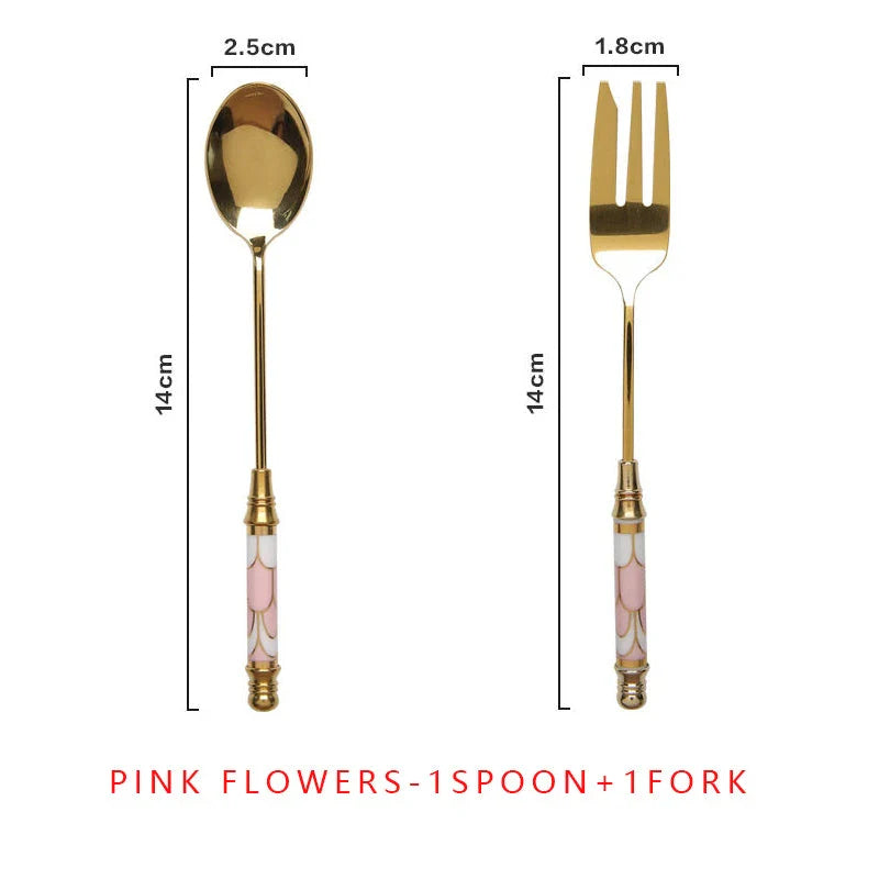 Elegant vintage gold and ceramic coffee and dessert utensil set with hand-painted handles in pink and blue tones