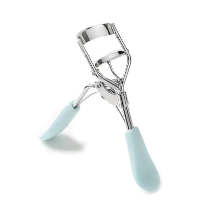 Heatless manual eyelash curler with curved design and silicone lash pad for effortless, dramatic lash curl