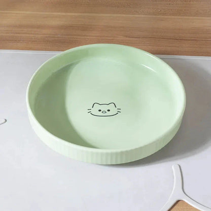 Adorable ceramic pet food and water bowl in pink color, perfect for cats and small dogs