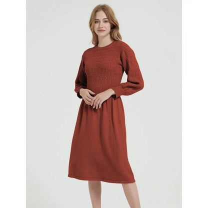 Elegant long sleeve knitted sweater dress in purple red with a classic A-line silhouette and mid-calf length