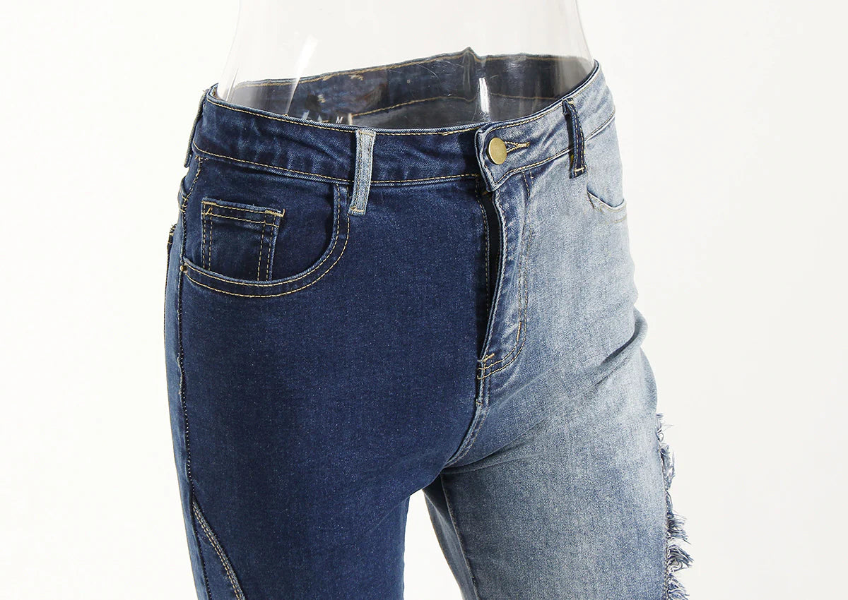 Geometric raw edge jeans with high-waisted, slimming design in blue denim