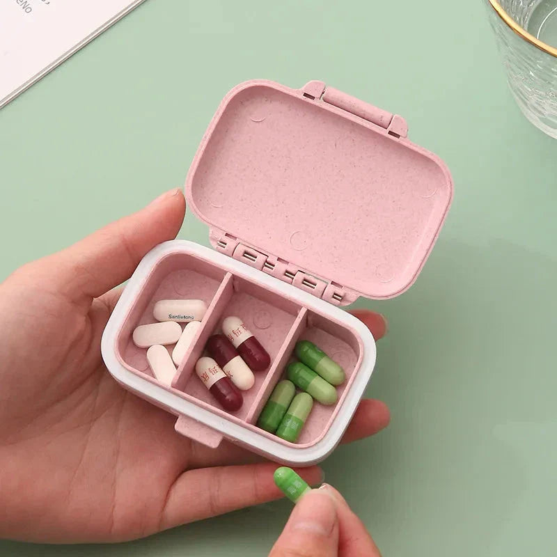 Compact, portable pill organizer with three separate compartments for organizing daily medications, vitamins, and supplements