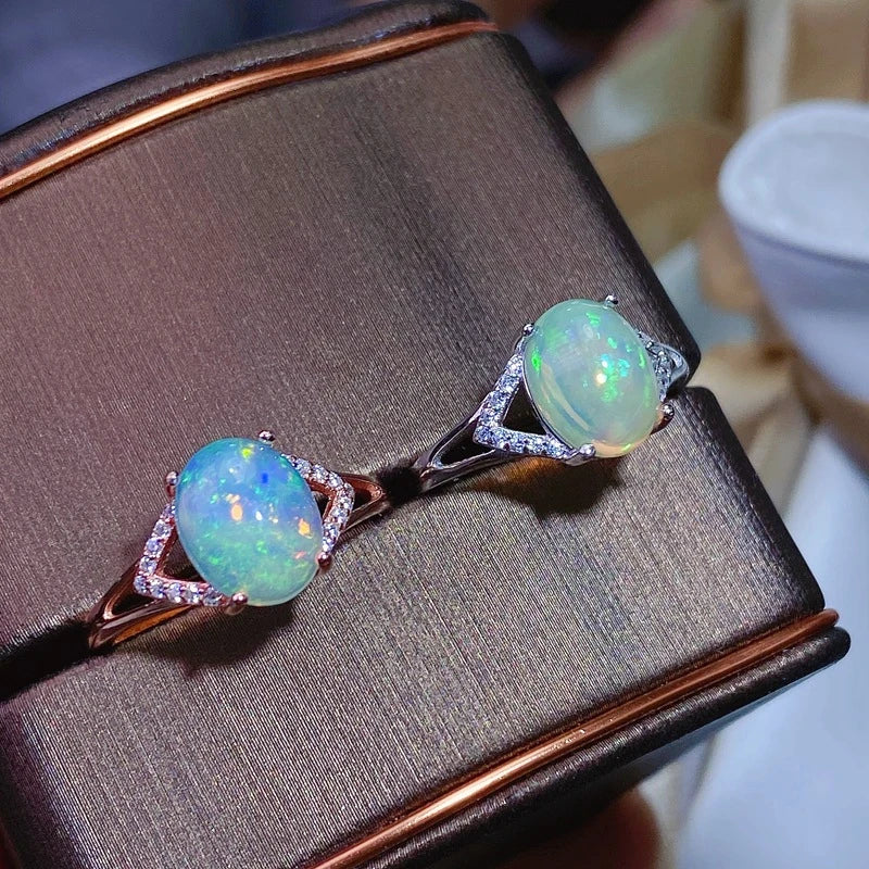Elegant 925 silver ring featuring a captivating natural Australian opal with a mesmerizing play of colors