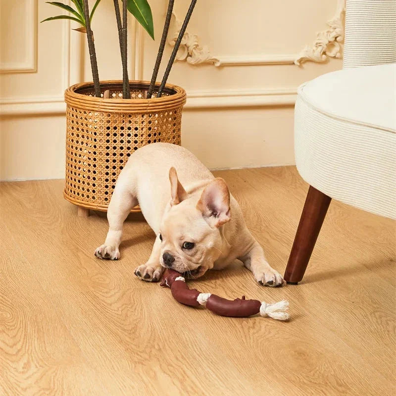 Durable cotton rope and vinyl sausage chew toy for dogs, designed to provide long-lasting entertainment and promote dental health.