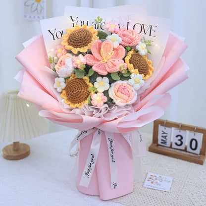 A knitted floral bouquet with vibrant flowers and LED lighting, creating a mesmerizing and elegant home decor piece.