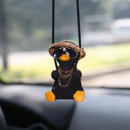 Cute swinging duck car pendant with a guitar and coke-themed design, adding a touch of personality to your vehicle