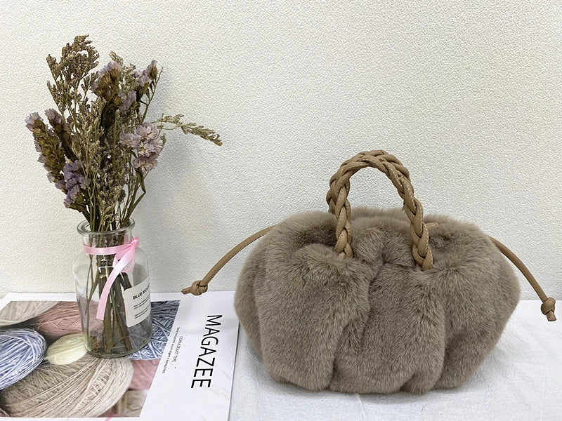 Elegant pleated leather and mink fur handbag in various colors, featuring a chic and modern cloud-like design