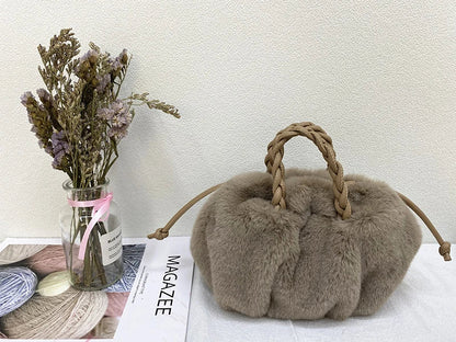 Elegant pleated leather and mink fur handbag in various colors, featuring a chic and modern cloud-like design