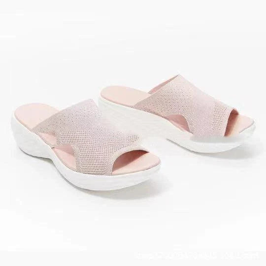 Comfortable plus-size women's sandals in various colors, featuring a fashionable and supportive design for warm-weather activities.