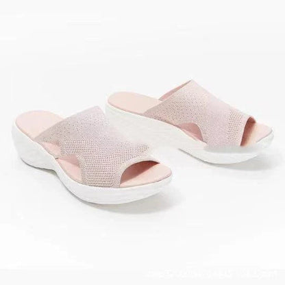 Comfortable plus-size women's sandals in various colors, featuring a fashionable and supportive design for warm-weather activities.
