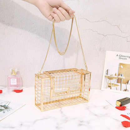 Metal shoulder bag with iron mesh design, adjustable chain strap, and compact size for versatile wear