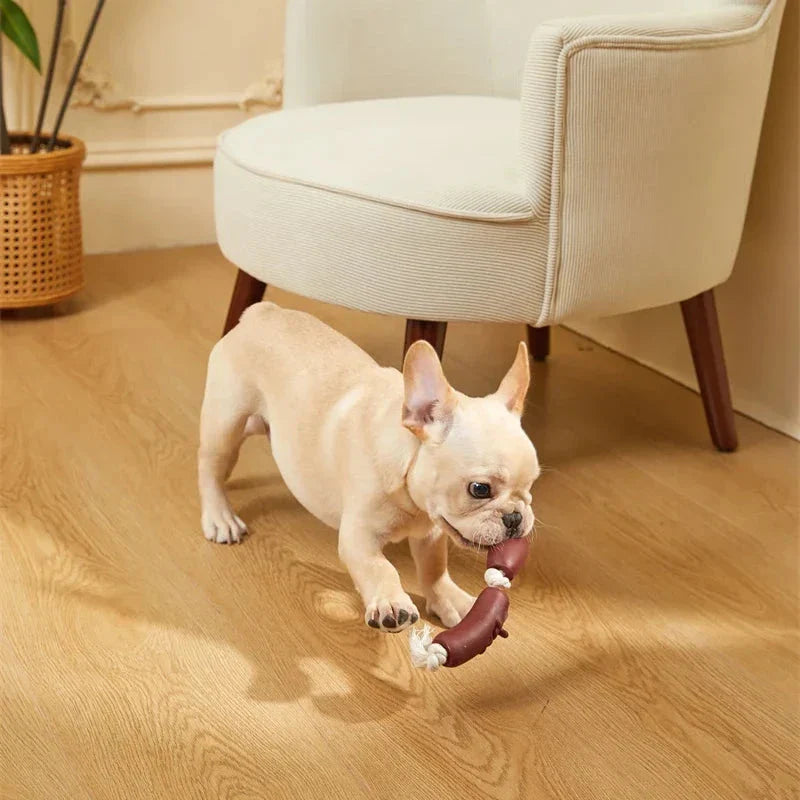 Durable cotton rope and vinyl sausage chew toy for dogs, designed to provide long-lasting entertainment and promote dental health.