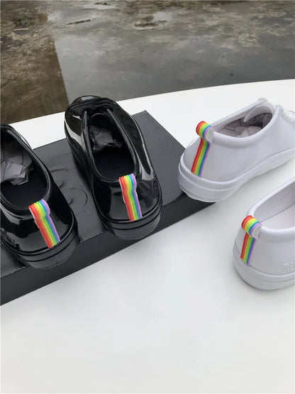 Premium lace-up sneakers for women with stylish flat design in black color