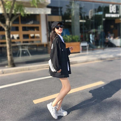 Stylish mid-length denim jacket for women with lotus leaf collar and loose, oversized fit