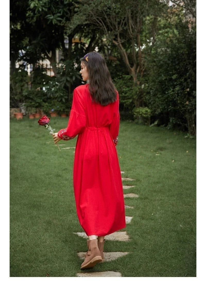 Elegant embroidered cotton-linen dress with tassels, featuring a waist-cinching A-line silhouette in vibrant colors