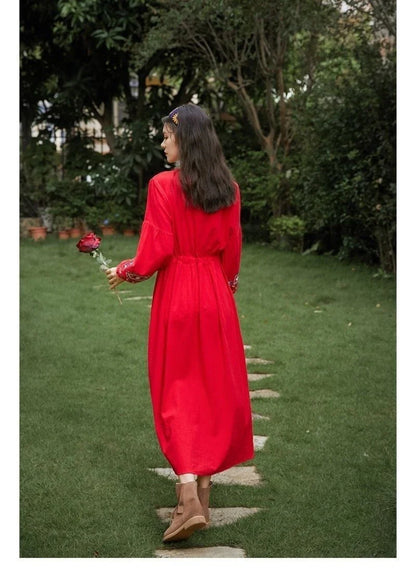 Elegant embroidered cotton-linen dress with tassels, featuring a waist-cinching A-line silhouette in vibrant colors