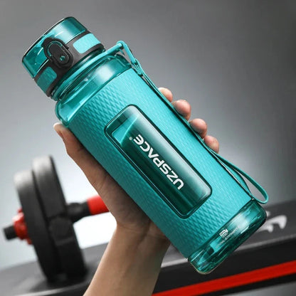 Portable sports water bottle with wide mouth, tea infuser, and leak-proof design for active lifestyles