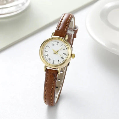 Elegant women's quartz leather wristwatch with a minimalist, timeless design