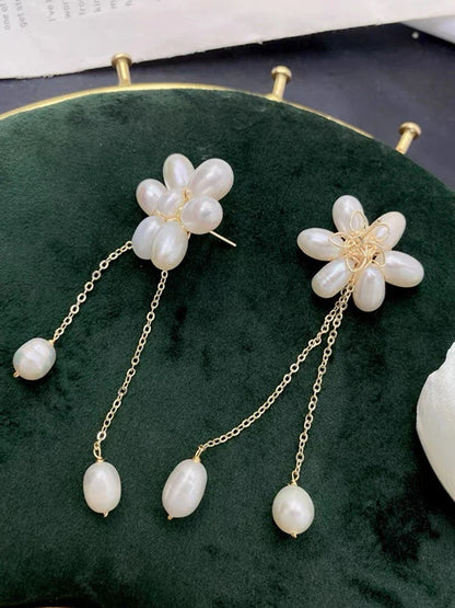 Elegant 14K gold-plated necklace with natural freshwater pearls in a unique cross-chain design