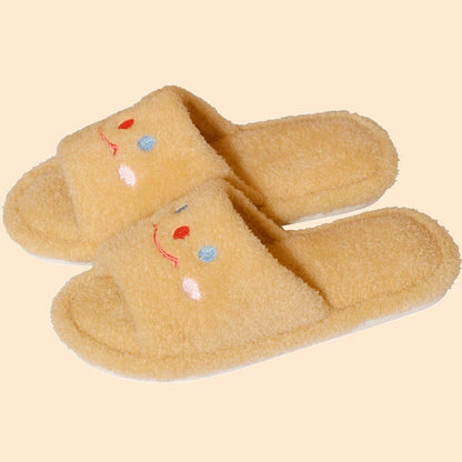 Cozy plush slippers with a smiling face design for comfortable indoor wear