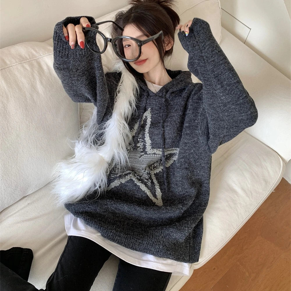 A cozy, vintage-inspired sweater with a five-pointed star design, made in America with premium polyester for lasting comfort and style.