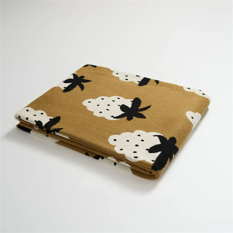 Cozy grape-patterned cotton blanket for comfortable relaxation and elegant home decor