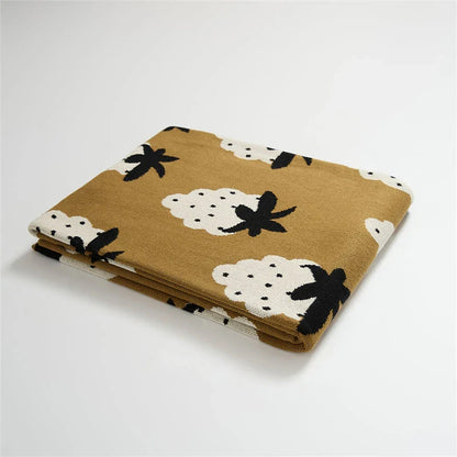 Cozy grape-patterned cotton blanket for comfortable relaxation and elegant home decor