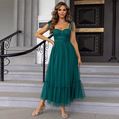 Fairy-inspired dress with mid-length silhouette, lace-up details, and luxurious polyester fabric