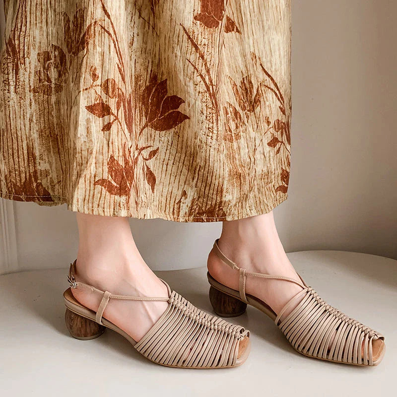 Stylish high heel genuine leather sandals in silver color with ankle strap and fashionable buckle closure