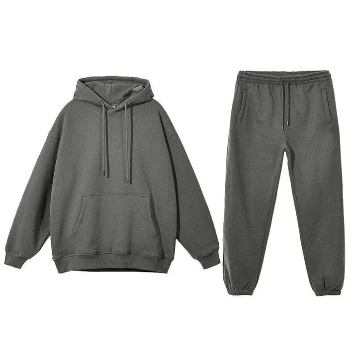 Cozy Fleece Hoodie and Sweatpants Set in Light Pink, featuring a relaxed fit and hooded design for maximum comfort and style.