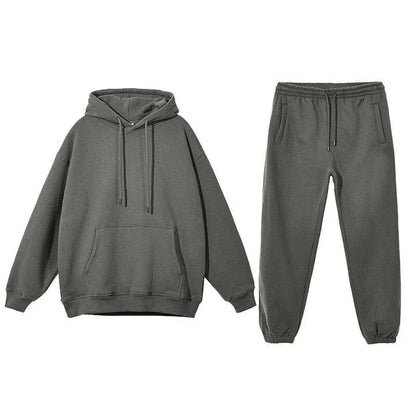 Cozy Fleece Hoodie and Sweatpants Set in Light Pink, featuring a relaxed fit and hooded design for maximum comfort and style.