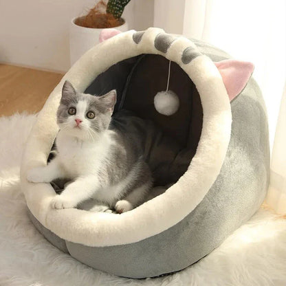 Cozy cat bed with plush cushion in various colors, providing a warm and comfortable winter retreat for cats and small dogs.