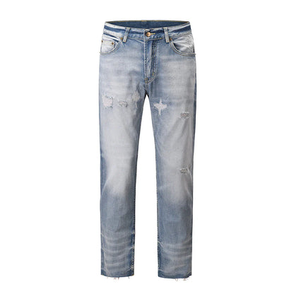 Premium distressed denim jeans with ripped detailing, perfect for casual streetwear style