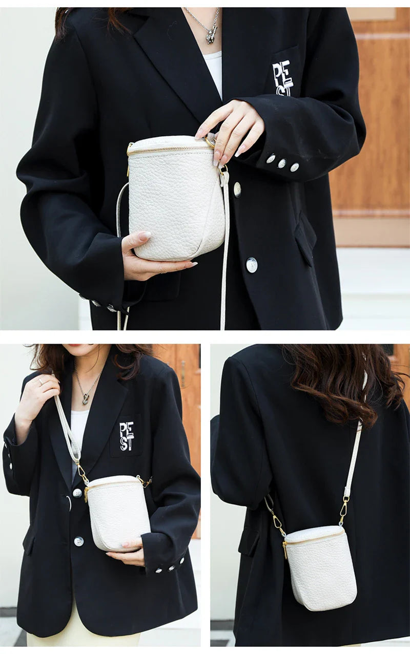 Premium leather crossbody bag with adjustable strap, multiple pockets, and sleek Korean-inspired style
