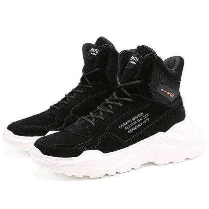 A pair of high-performance men's casual sports shoes made with premium pig eight leather and a thick rubber sole for superior comfort and durability.