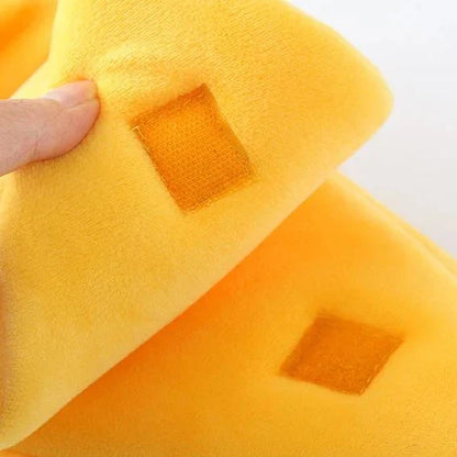 Cozy banana-shaped pet bed in various sizes and colors, providing plush comfort and support for cats and dogs