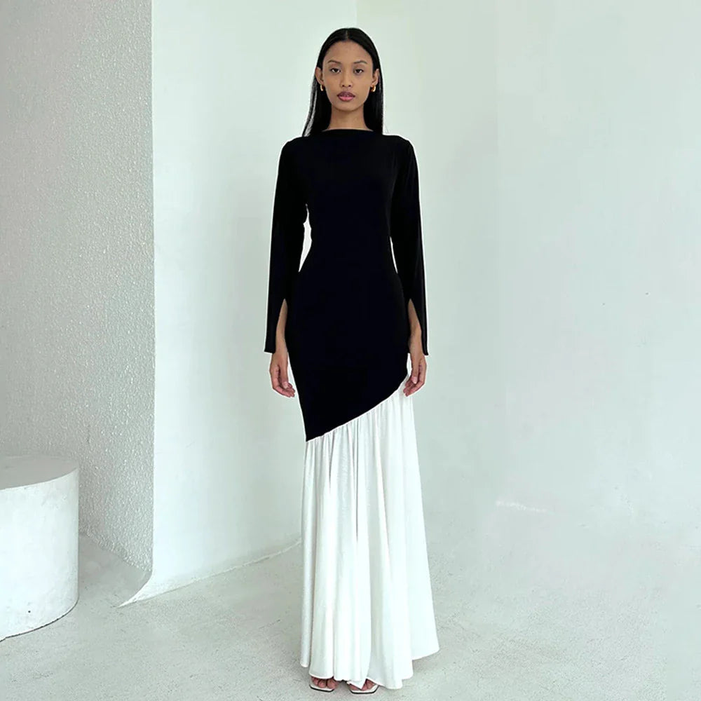 A stylish long sleeve dress with a slim, figure-flattering silhouette and classic round neckline