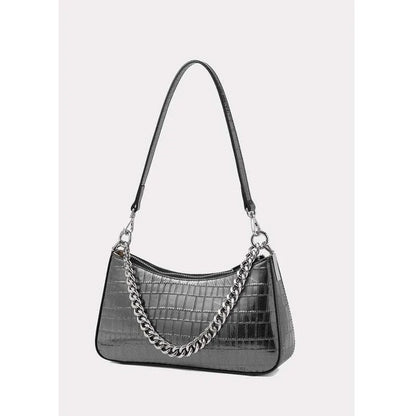 Elegant alligator print leather shoulder bag with chic chain decoration, versatile hobo shape, and interior organization pockets