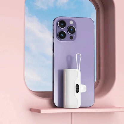 Compact 10000mAh wireless power bank with dual charging ports, fast charging, and portable design