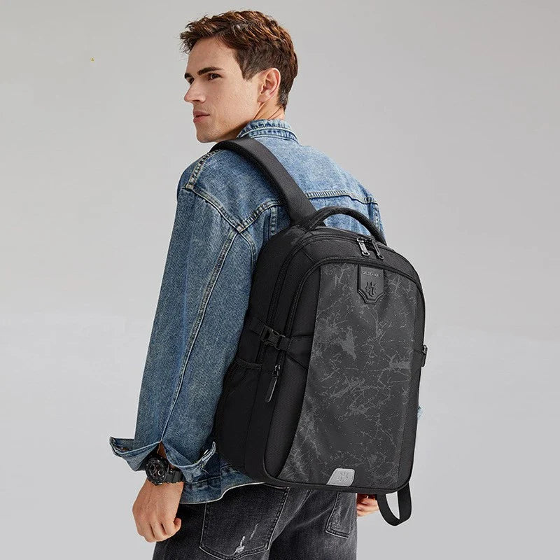 A sleek and stylish anti-theft backpack with a physiological curve back plate for comfortable carrying, made of waterproof and breathable polyester materials.