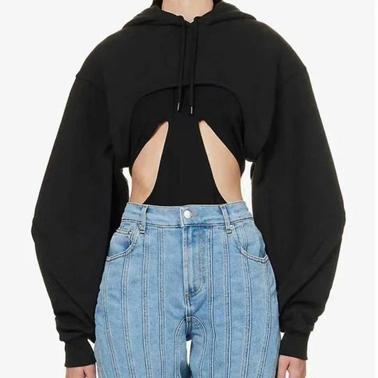 Fashionable hooded sweatshirt for women with open sleeves, asymmetrical decoration, and a relaxed, comfortable fit