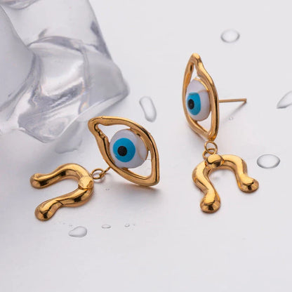 Pair of 18K gold plated stainless steel asymmetrical devil's eye earrings with a dripping oil finish