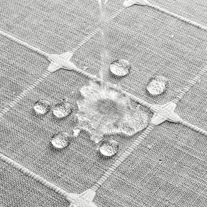 Elegant jacquard linen shower curtain with charming tassels in light grey color, adding sophisticated style to any bathroom