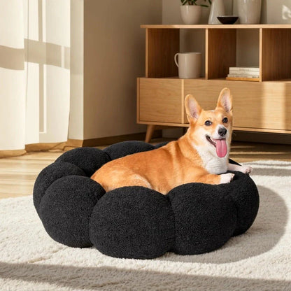 A cozy, flower-shaped dog bed made of soft, plush teddy sherpa fabric with raised edges for head and neck support, providing a calming and comfortable resting spot for medium-sized dogs.
