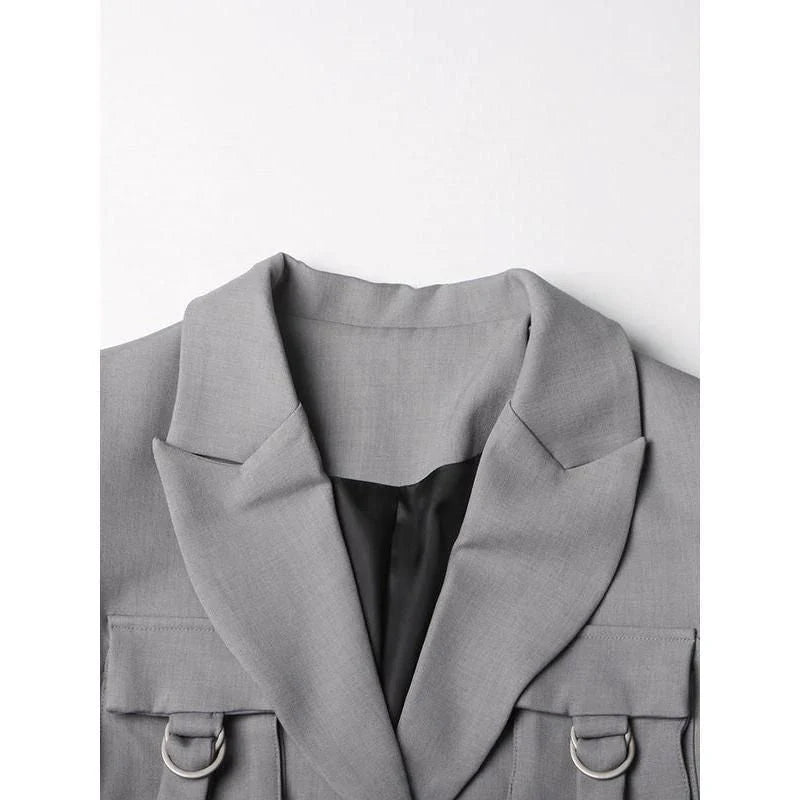 Stylish patchwork windbreaker trench coat with notched collar, button detailing, and flattering wide-waisted cut