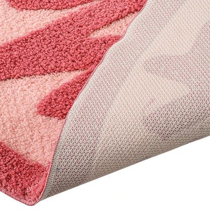 Cozy pink heart-shaped tufted rug with 'GRL PWR' message, perfect for girls' rooms, dressing rooms, and bathrooms