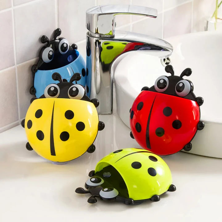 Colorful ladybug-shaped toothbrush holder with suction cup for easy wall mounting and organized storage