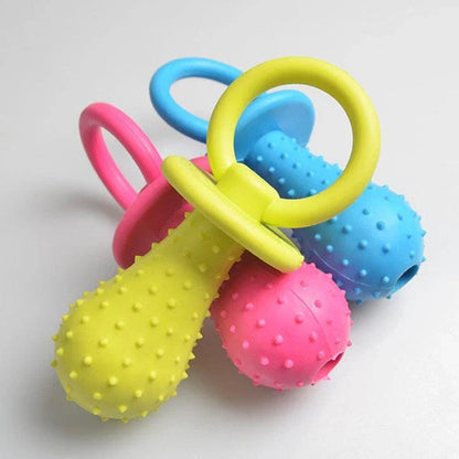 Premium chew toy for dogs made of durable rubber in a unique dummy design to satisfy your furry friend's natural chewing needs