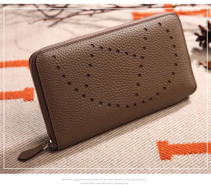 Premium cowhide leather clutch bag with lychee pattern design, featuring a medium-sized square shape and versatile style